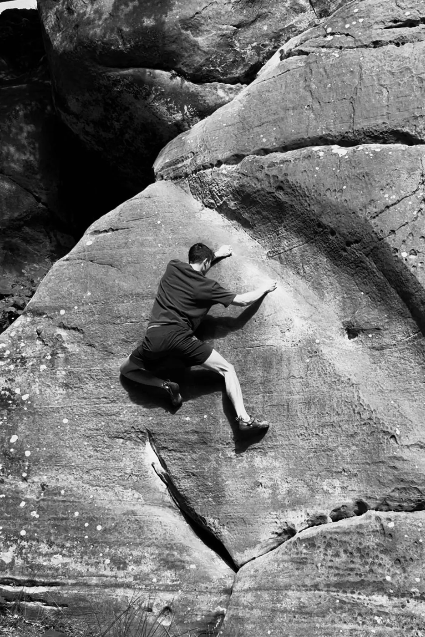 Louis bouldering on gritstone